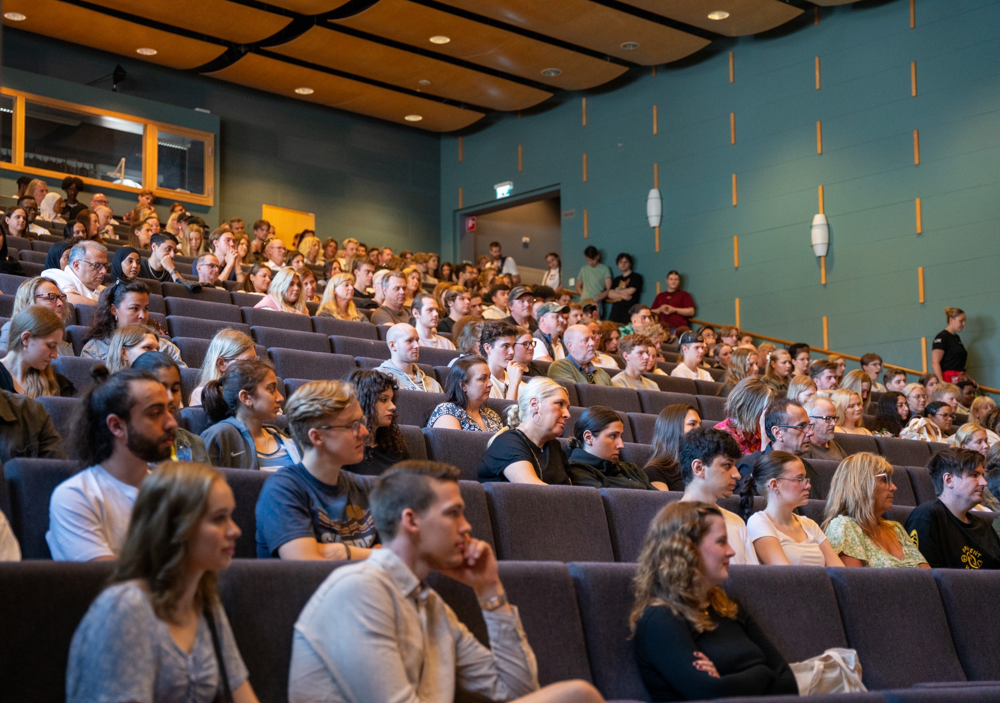 Åhörare i en aula