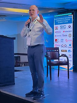 Duncan Levinsohn speaking on stage at the SWC Summit in Nairobi.